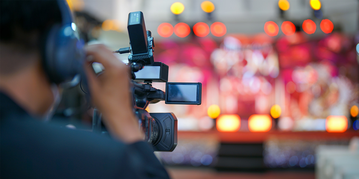 videographer documenting an event